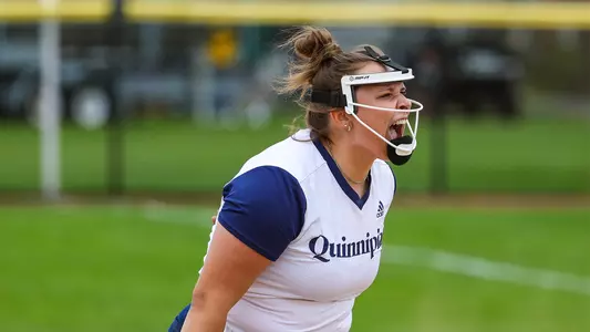 Sydney Horan celebrates after striking out a player against Rider