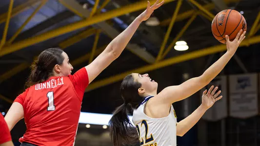 Mackenzie DeWeese attempts a reverse layup vs Marist