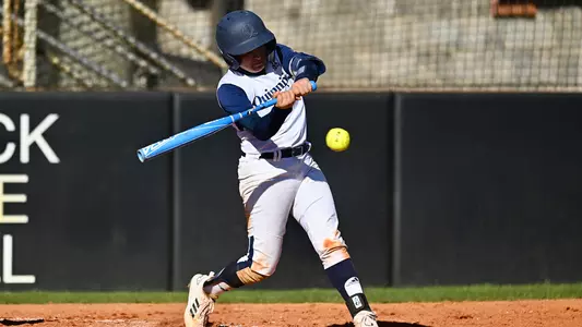 A QU softball player takes an at bat against North Carolina A&T