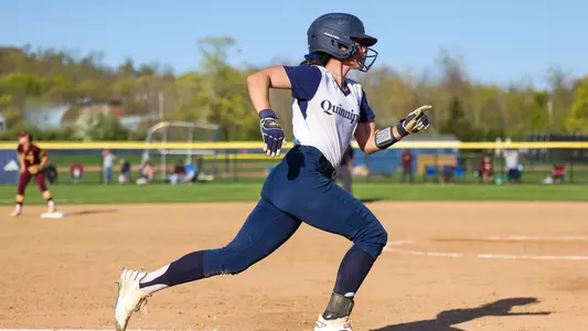 Bridget Nasir runs along the baseline to score against Iona