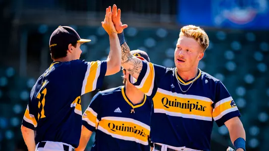 Swenson celebrates at home plate