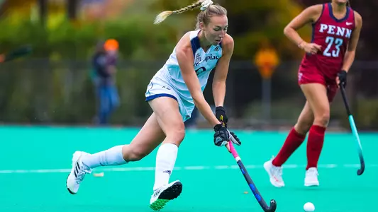 Stella Tegtmeier carries the ball up field
