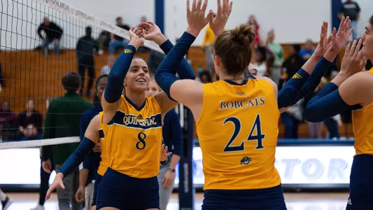 Milena Silva high fives teammate