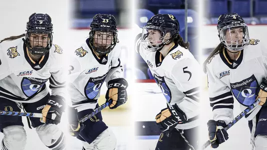 Alexa Hoskin, Sadie Peart, Kate Reilly and Kendall Cooper in full gear on the ice facing the camera during a game.