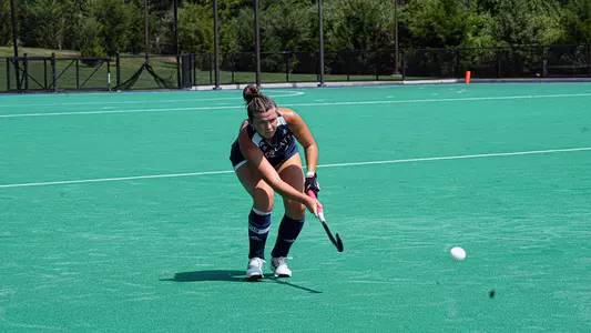 Olivia Howard sends pass upfield