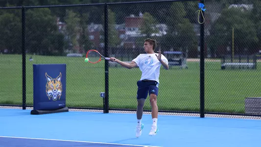 Carlos Braun Simo hits a forehand