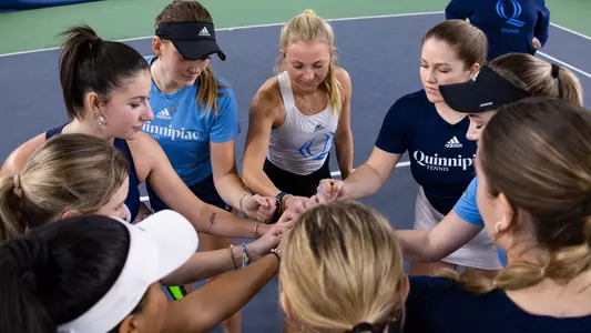 Women's tennis team huddle