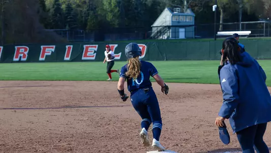 Amanda Engel rounding first