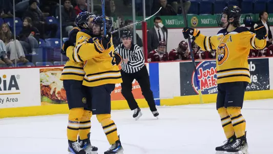 Cerbone, Borgula and Pennington Celebrate a Goal against Colgate (Jan. 17, 2025 in Hamden, Conn.)