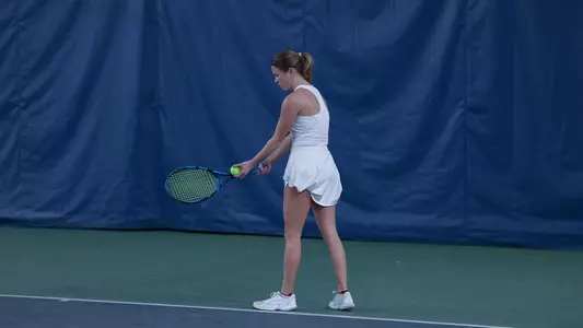 Ella Lewis gets ready to serve at North Haven Health & Racquet club (Jan. 23, 2025)