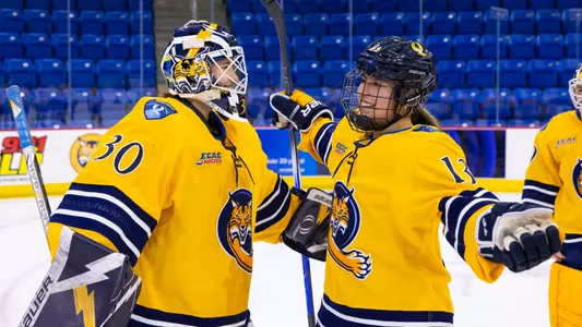 Felicia Frank and Meg Rittenhouse hug after a win over SHU. (Dec. 3, 2024)