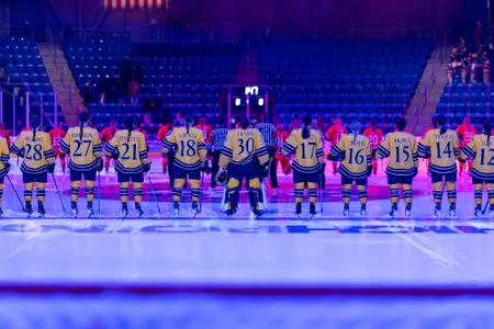 Quinnipiac women's ice hockey during national anthem (11.7.25 in Hamden, C.T.)