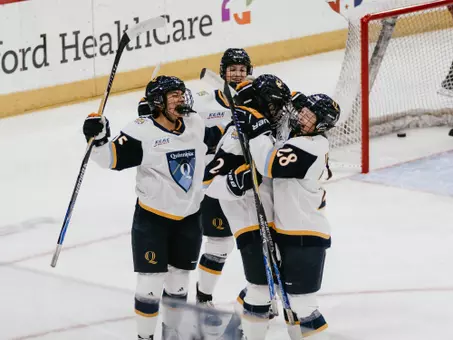 Girls celebrating on the ice after Zoe Uens scored goal (11.1.25 in Hamden, C.T.)