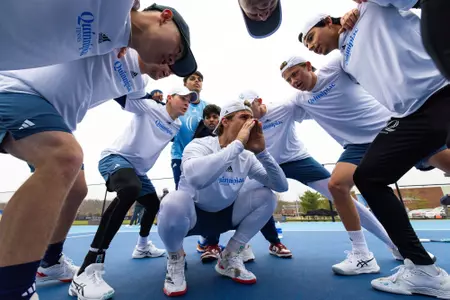 Men's tennis huddle before match vs Rider (3.30.25 in Hamden, CT)