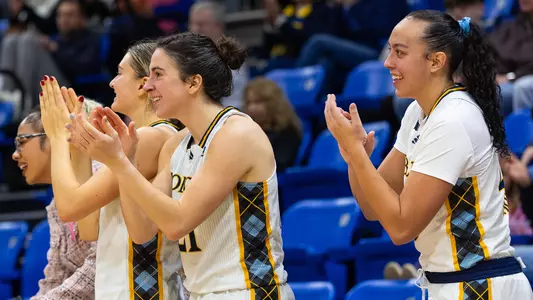 Paige Girardi, Jackie Grisdale, and Sydney Ryan Applaud on the Bench (Nov. 23 vs Colgate in Hamden, Conn.)
