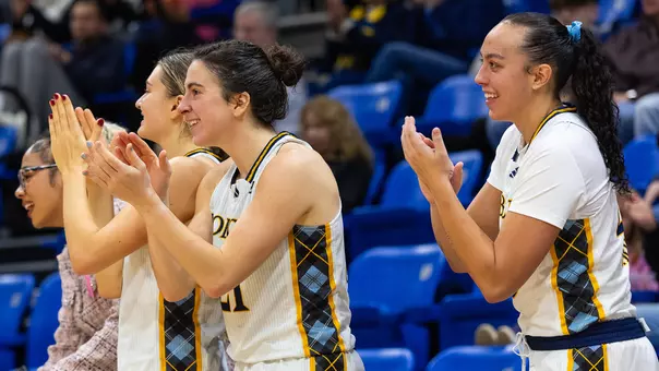 Paige Girardi, Jackie Grisdale, and Sydney Ryan Applaud on the Bench (Nov. 23 vs Colgate in Hamden, Conn.)