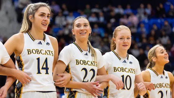 Emma Lizotte, Reagan Sipla, Maria Kealy, and Ava Sollenne Stand At Free Throw Line (Vs. Manhattan, Dec. 19)
