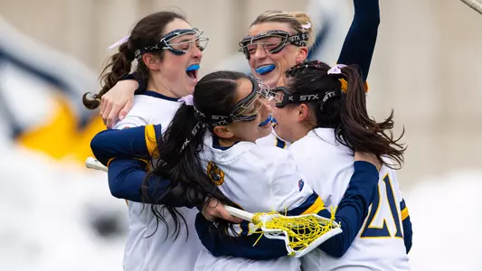Women's Lacrosse Celebrates a Goal (Feb. 12, 2025 in Hamden, Conn.)