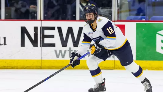 Mia Lopata looks to make a pass in a game against Yale at M&T Bank Arena (Jan. 24, 2025)