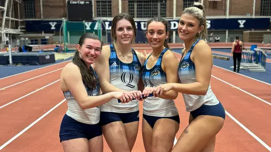 Bobcats' 4x400 Relay Team Poses With Baton (Feb. 15, 2025 in New Haven, Conn.)