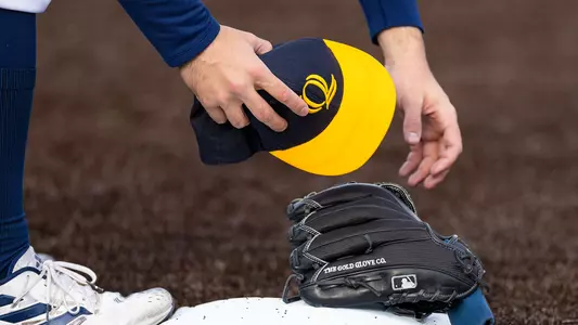 Baseball Player Picks Up Hat and Glove vs Iona (April 5, 2024)