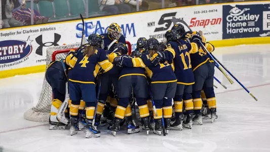 Women's Ice hockey huddle before a game against Clarkson at Cheel Arena (March 2, 2025)