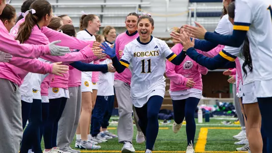 Emma Miller-Ayala runs through the starters tunnel against CCSU (Feb. 12, 2025 in Hamden, Conn.)