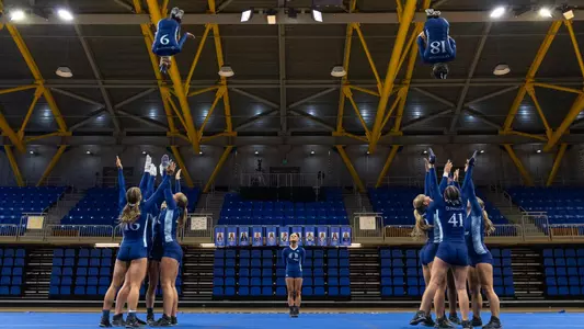 Alyssa Dillon and Emily St. Onge In the Air During Toss (March 23, 2025 in Hamden, Conn.)