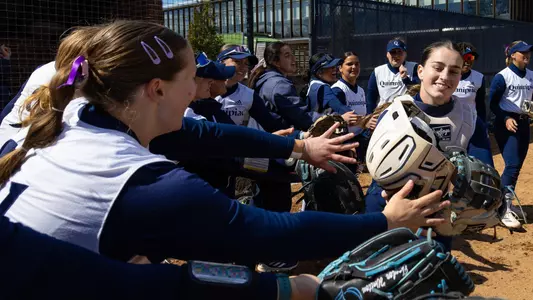 Kennedy DeMott goes through the team during starting lineups before a game in Hamden (March 22, 2025)