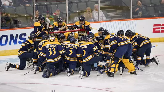 Men's Hockey Huddles Around the Net Before Game vs. UConn (3/28/25 in Allentown, Pa.)