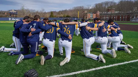 Baseball Team Huddle vs Manhattan (3.28 in Hamden, Conn.)