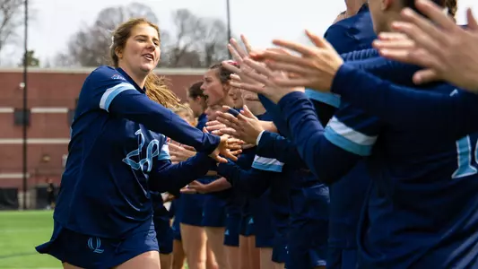 Sophia Coan runs through the starter line at Fairfield (April 2, 2025 in Fairfield, Conn.)