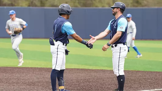 Gabe Wright and Coach Trey Stover High-Five vs CCSU (April 19th, 2025 in Hamden, Conn.)