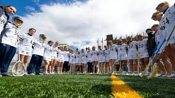 Women's Lacrosse Team Huddle Before its Game Against Canisius (April 16, 2025 in Hamden, Conn.)