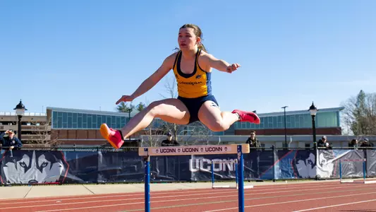 Sydney Lavelle Jumps Over a Hurdle at UConn (March 30, 2024 in Storrs, Conn.)