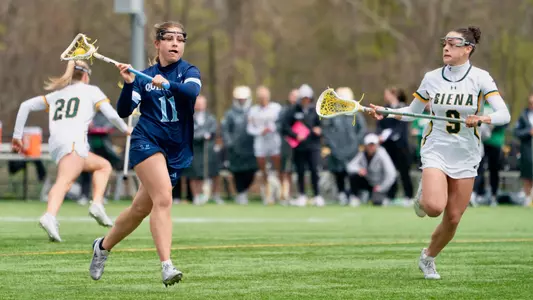 Emma Miller-Ayala Brings the Ball Up the Field Against Siena (April 27, 2025 in Loudonville, N.Y.)