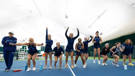 Quinnipiac Women's Tennis celebrates a point in the MAAC Championship match (April 27, 2025)