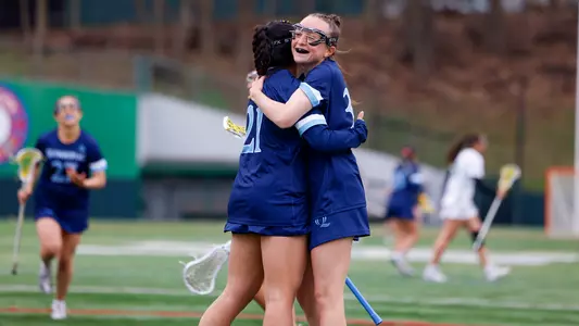 EllaGrace Delmond and Ava Clemson Celebrate a Goal at Manhattan (April 5, 2025 in Bronxville, N.Y.)