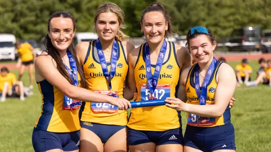 The 4x400 Relay Team Pose After Their Bronze Medal