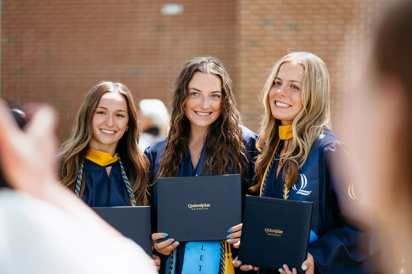 Quinnipiac University School of Business and School of Computing and Engineering attend their respective schools’ commencement ceremonies at the Mount Carmel Campus on Sunday, May 11, 2025.