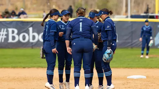 QU Softball infielders get ready before an inning in Hamden (April 13, 2025)