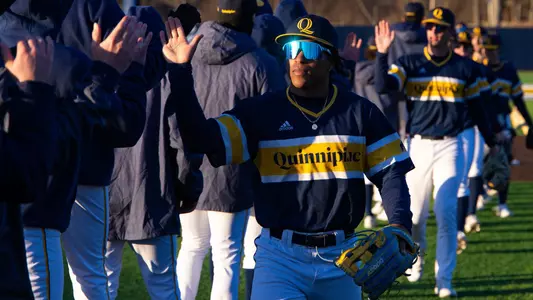 Gabe Wright High Fives Line After Win vs. Iona (March 7, 2025 in Hamden, Conn.)