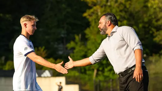 Eric Da Costa high fives Benjamin Telle during a game against Columbia in Hamden, Conn. (Aug 3, 2024)