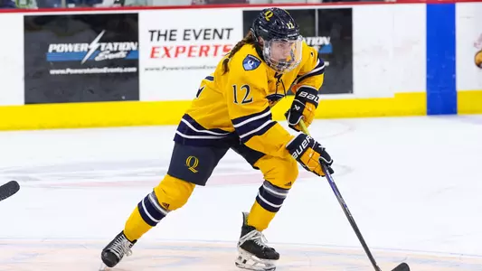 Emerson Jarvis Carries the Puck Against Harvard (Feb. 22, 2024 in Hamden, Conn.)
