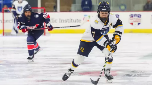 Tessa Holk Controls the Puck against UConn (Sept. 20, 2025 in Hamden, Conn.)