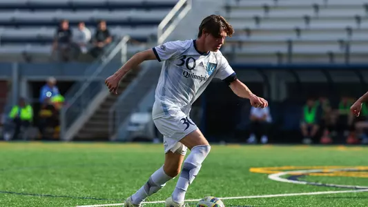 Fredrik Moen dribbles the ball in a game against Merrimack in Hamden (Oct. 30, 2024)