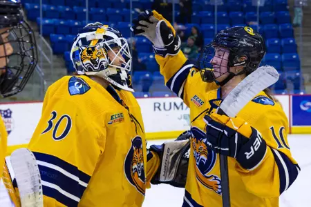 Felicia Frank and Avery Bairos celebrating win over Dartmouth (1.16.26 in Hamden, C.T.)