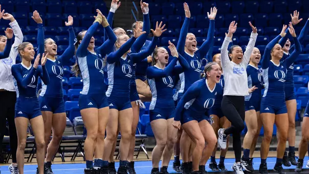 The Bobcats Celebrate on the Bench Against Oregon