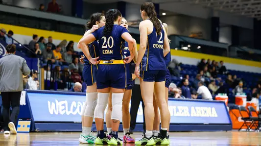 WBB Team Huddle in Win over Merrimack (Jan. 19, 2026 in North Andover, Mass.)