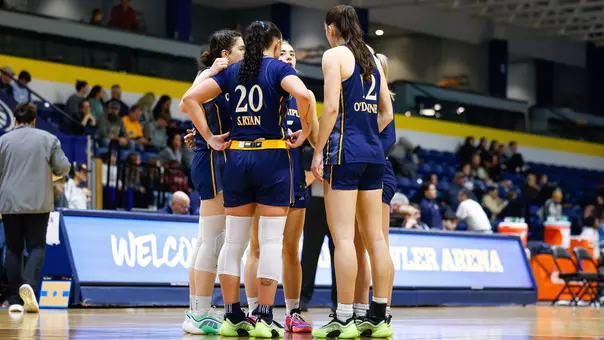WBB Team Huddle in Win over Merrimack (Jan. 19, 2026 in North Andover, Mass.)